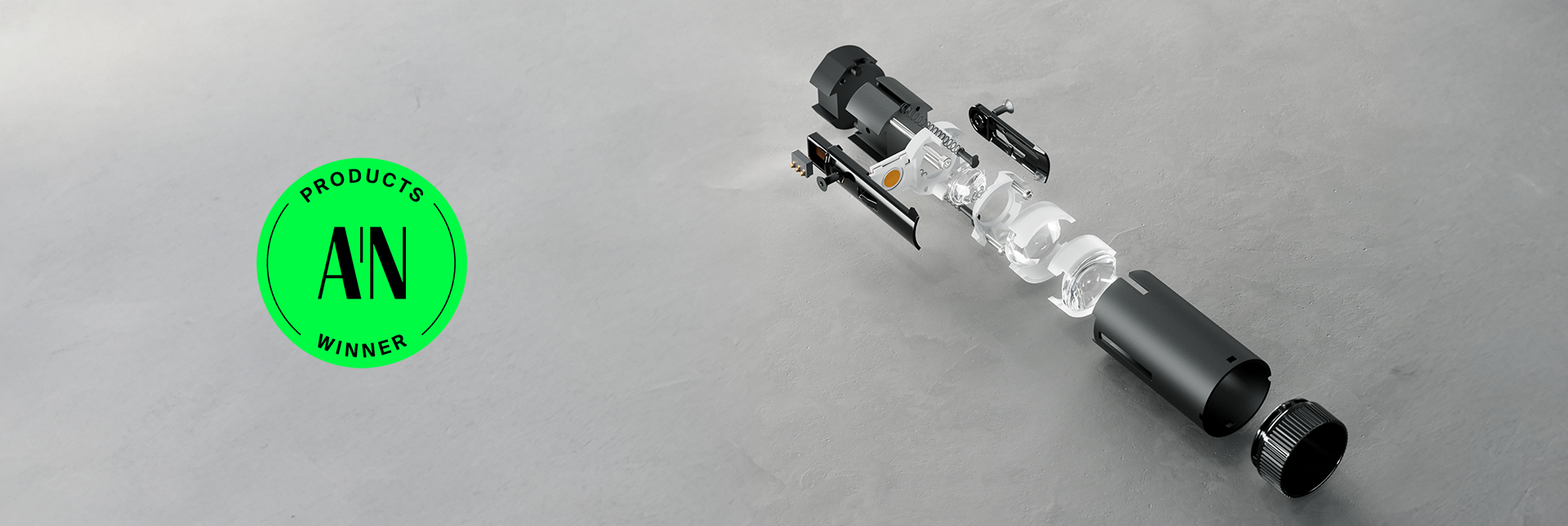 Exploded view of DMF Lighting's True 1 downlight highlighting its modular components and optical system alongside the AN Products Winner award badge.