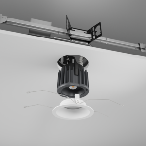 Exploded view of a DMF C Series 4-inch downlight showing the housing, light engine, and white trim assembly.