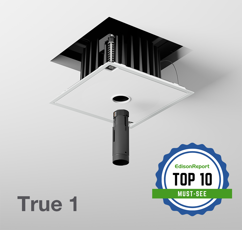 DMF Lighting True 1 recessed downlight with black housing installed in ceiling, showing cylindrical LED module dropping below white mud-in plate